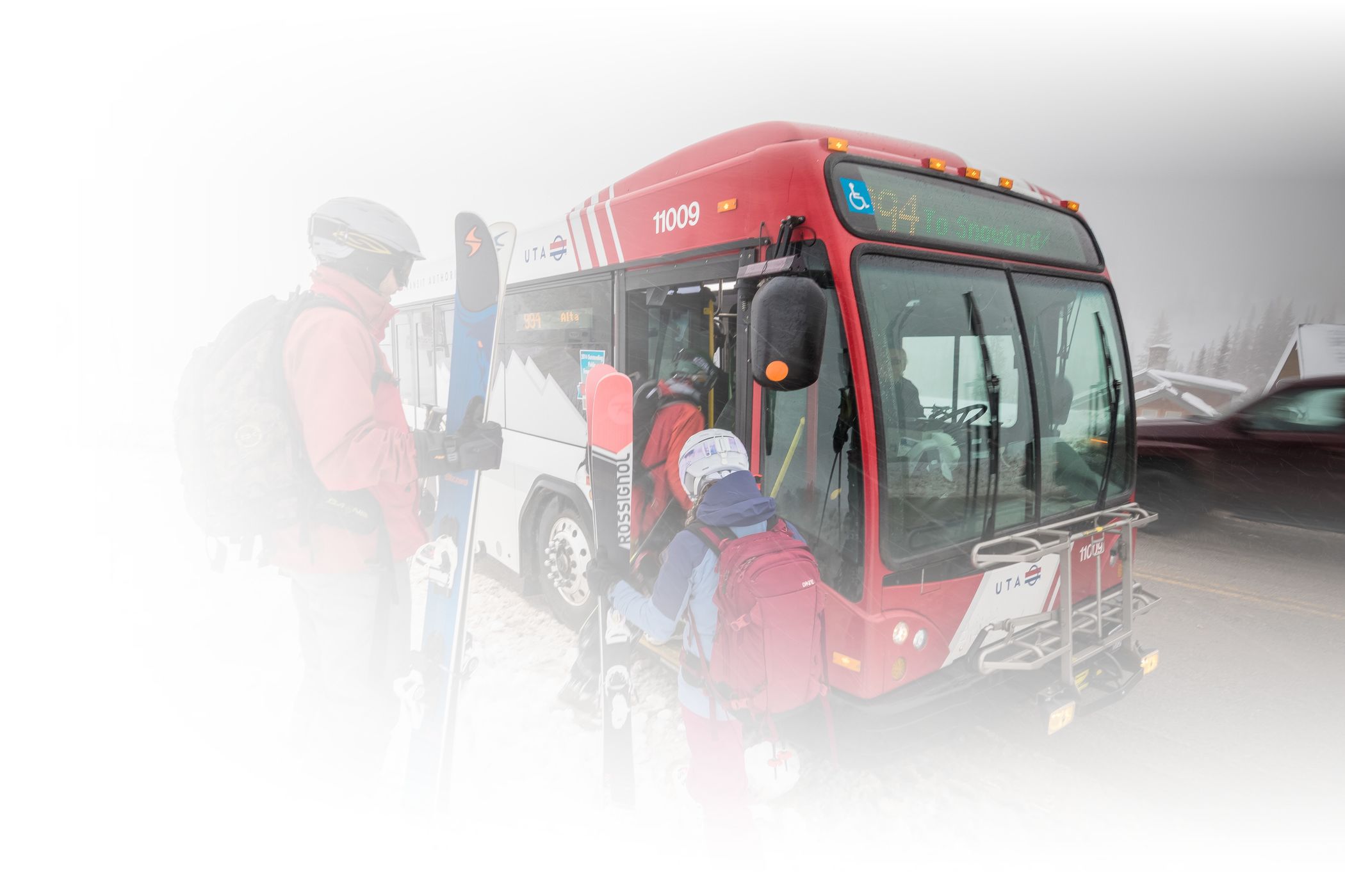 Skiers wait to load the UTA Ski Bus