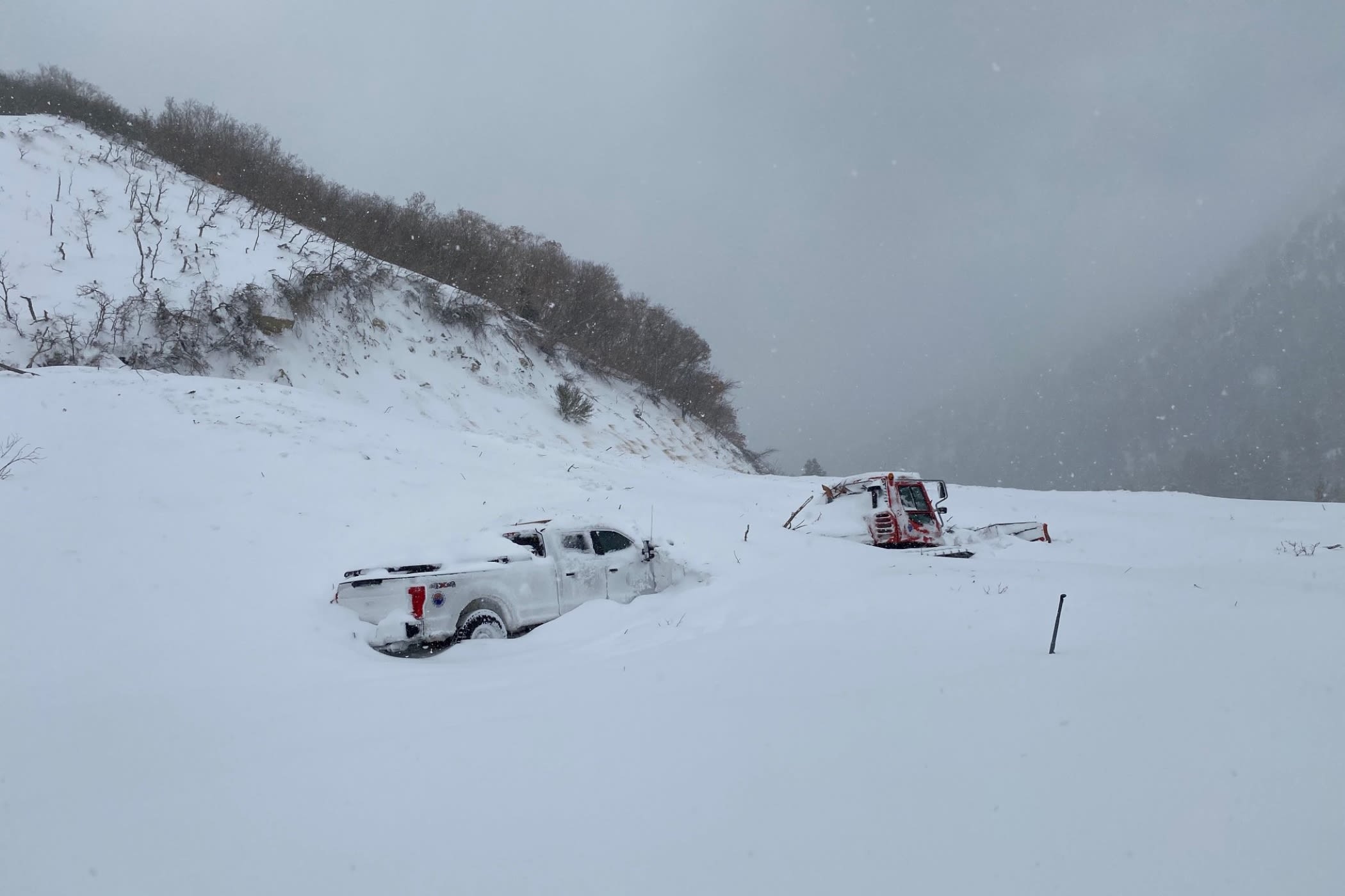 A UDOT truck caught in a natural avalanche