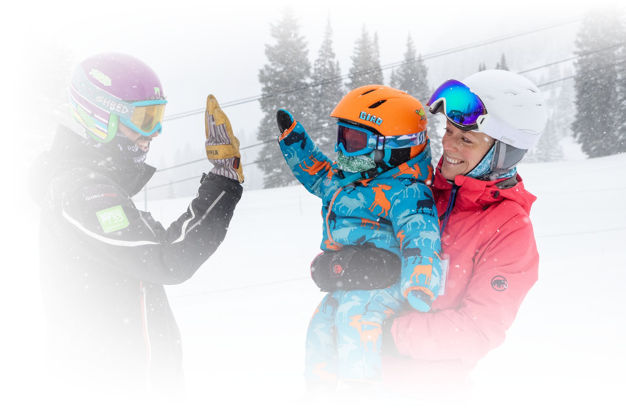 Season Pass Benefits Marquee Image of High-fives in the snow