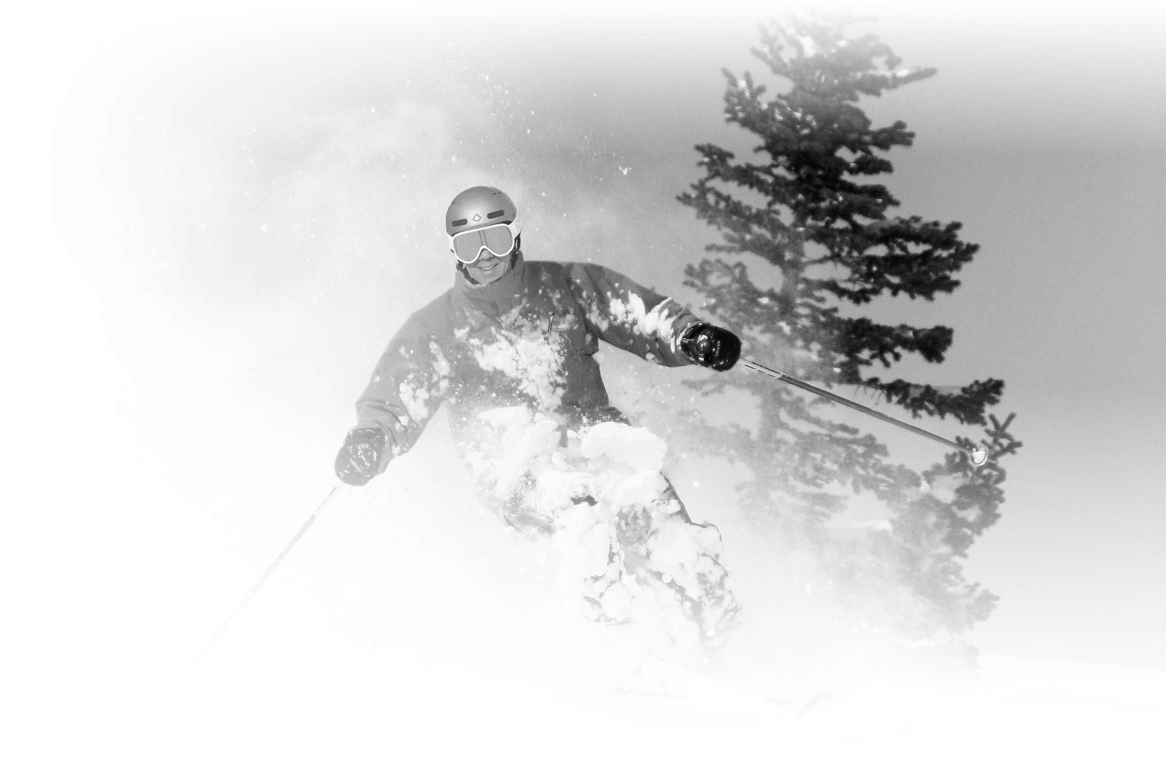 A ski instructor from the Alf Engen ski school enjoys some powder turns at Alta Ski Area