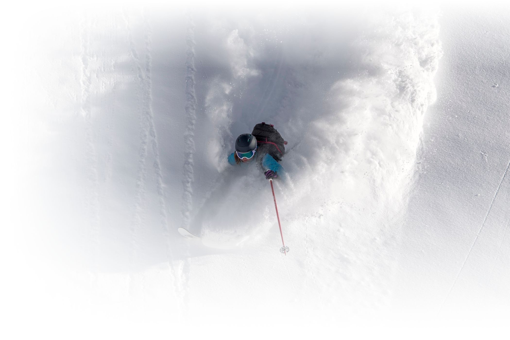 Mali Noyes skis deep powder at Alta Ski Area