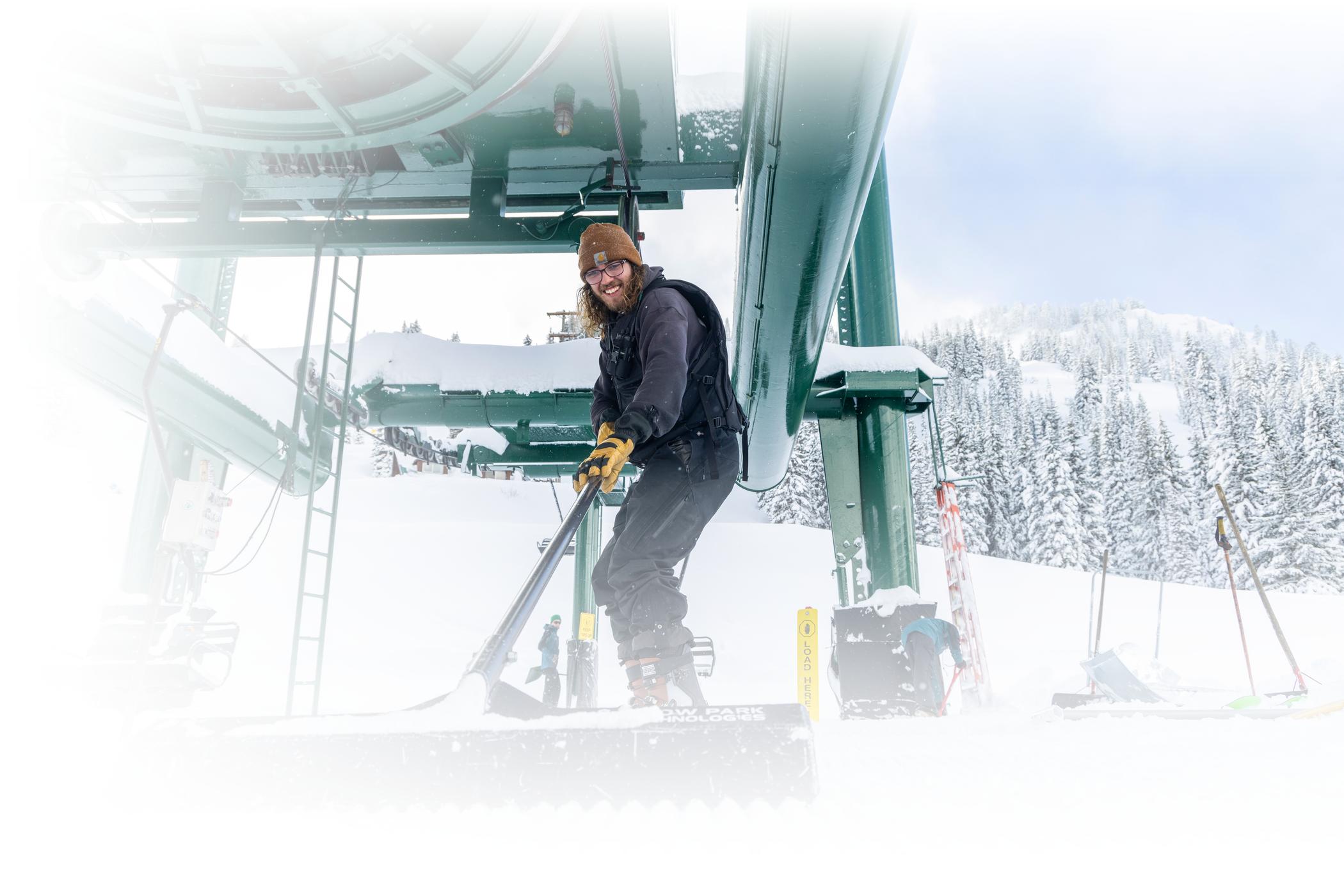 An Alta employee prepares the ramp for Wildcat lift on a winter day at Alta Ski Area